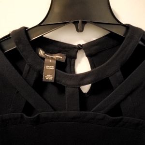 INC long sleeve. Top cutout. Size S